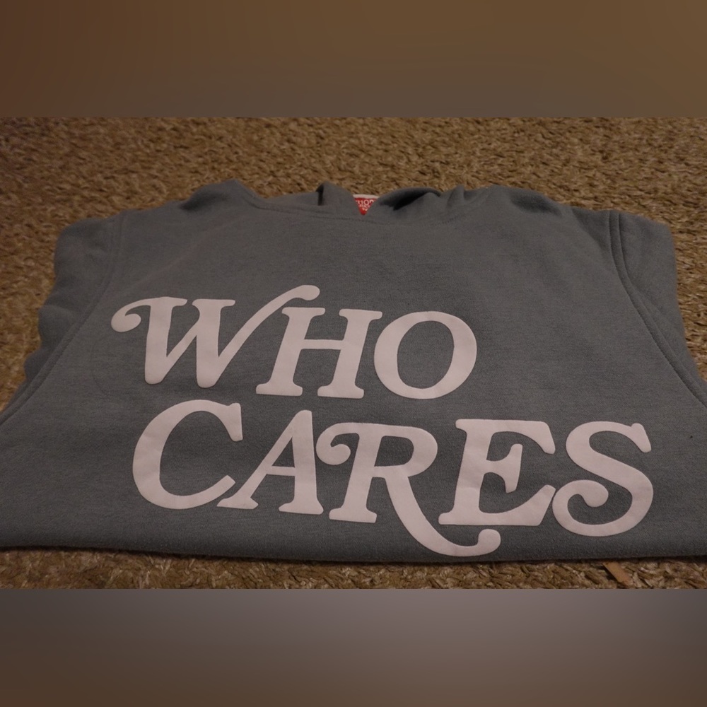Men’s WHO CARES Sweater